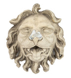 early recast of oversized lionhead used during renovation of george j. johnson's iron block (1860)