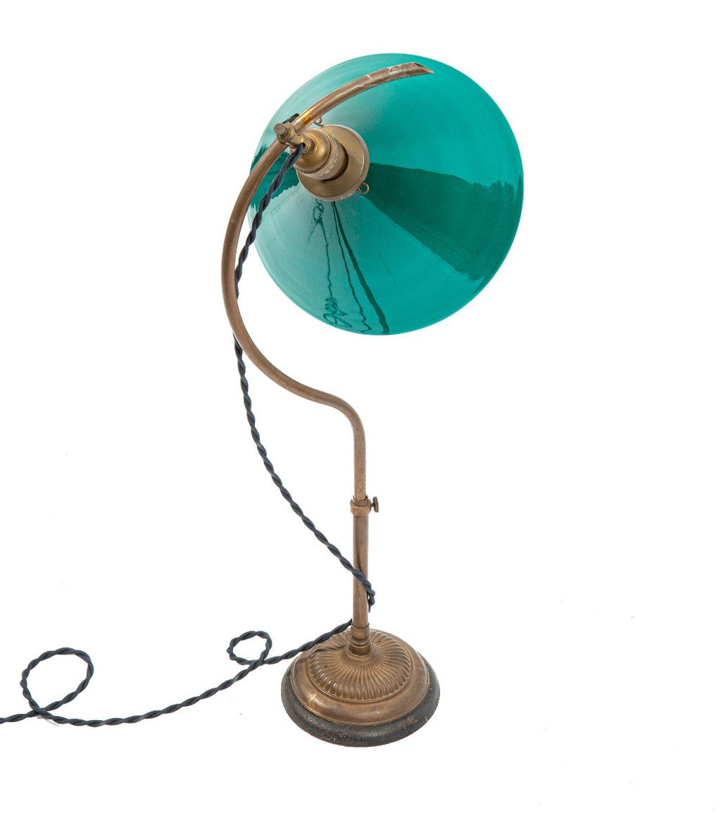 all original early 20th century fully adjustable tubluar brass "c-arm" faries desk lamp with nicely aged patina