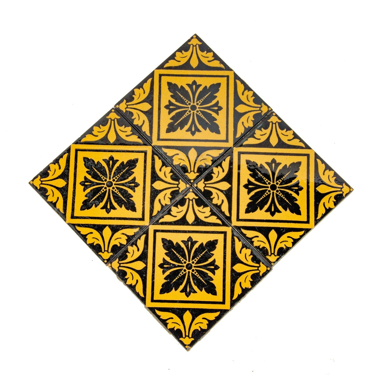 group of four matching exterior salvaged chicago black and yellow glazed 1870s facade tiles