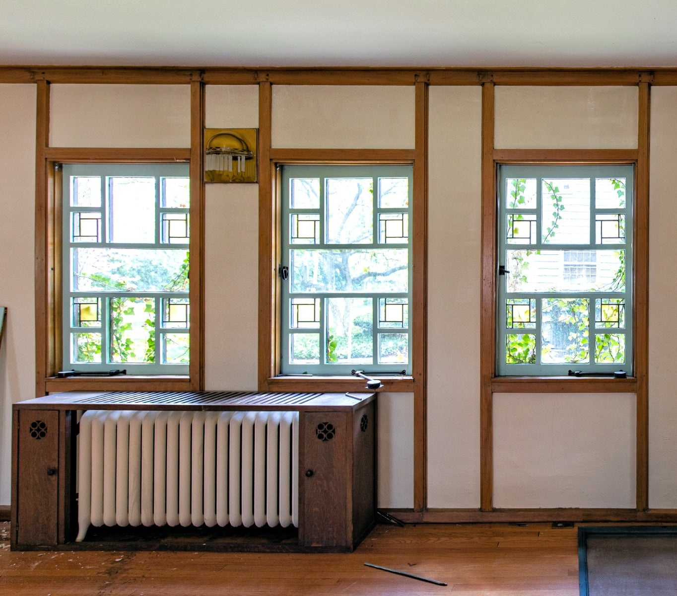 one of several matching wood and leaded glass william f. tempel windows designed by walter burley griffin