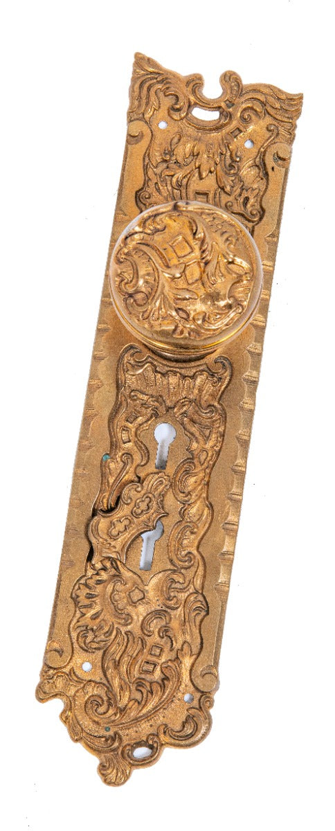 early 20th century "belforte" pattern ornamental cast bronze residential entrance door backplate and matching doorknob