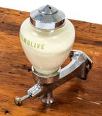original and fully functional american depression-era salvaged art deco palmolive glass soap dispenser