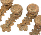 lot of original well-maintained ornamental cast bronze mccc/re matching doorknobs and backplates with swinging keyhole covers