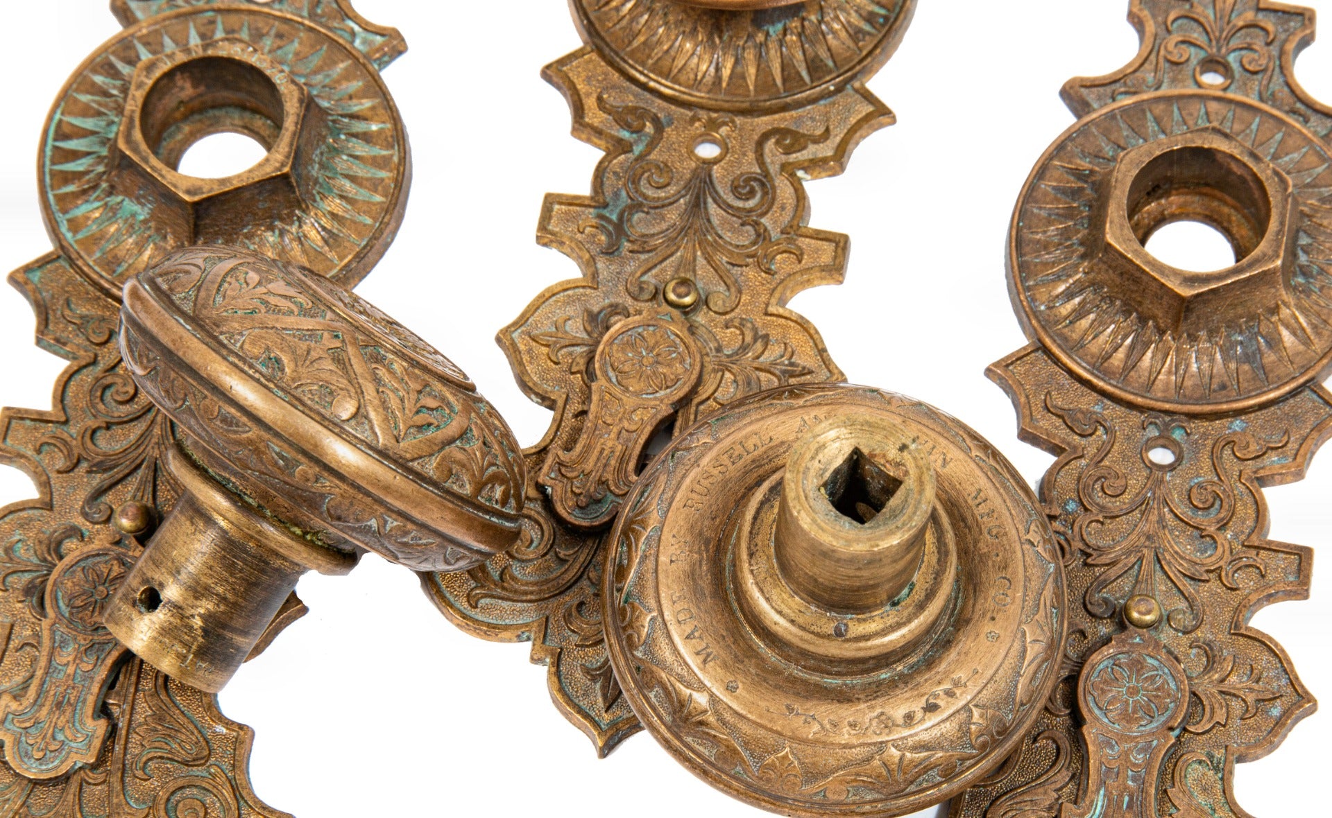 lot of original well-maintained ornamental cast bronze mccc/re matching doorknobs and backplates with swinging keyhole covers