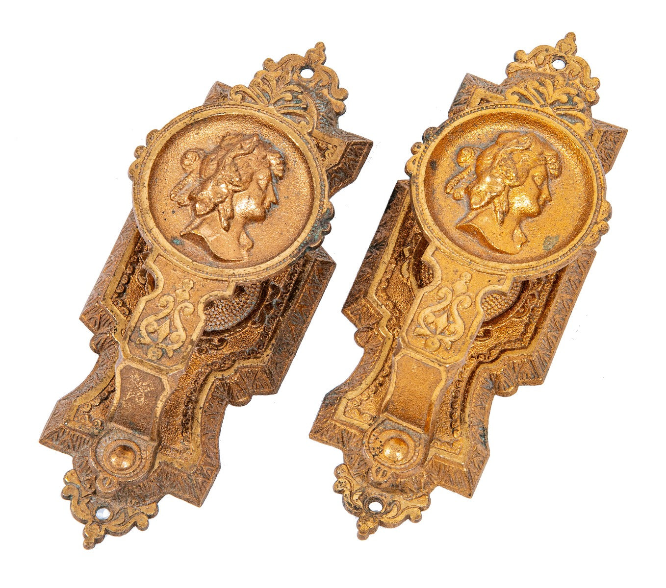 matching set of oversized 1870s high victorian ornamental cast bronze interior residential figural curtain tiebacks