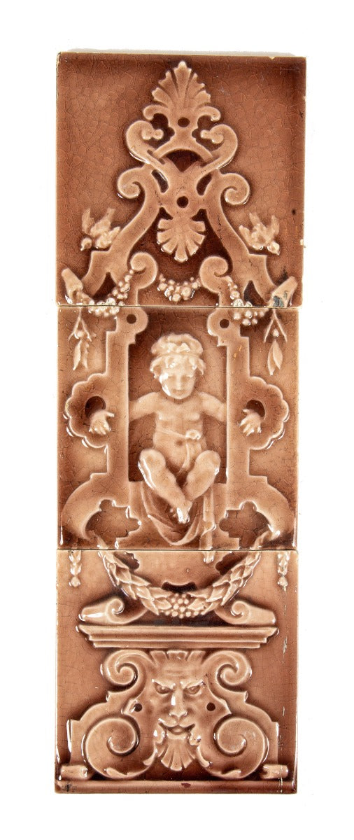unique three-piece late 19th century antique american majolica tile fireplace set with full-figured cherub