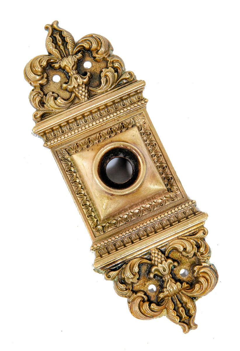 original early 20th century "altena" pattern cast brass exterior residential doorbell backplate with uniform patina
