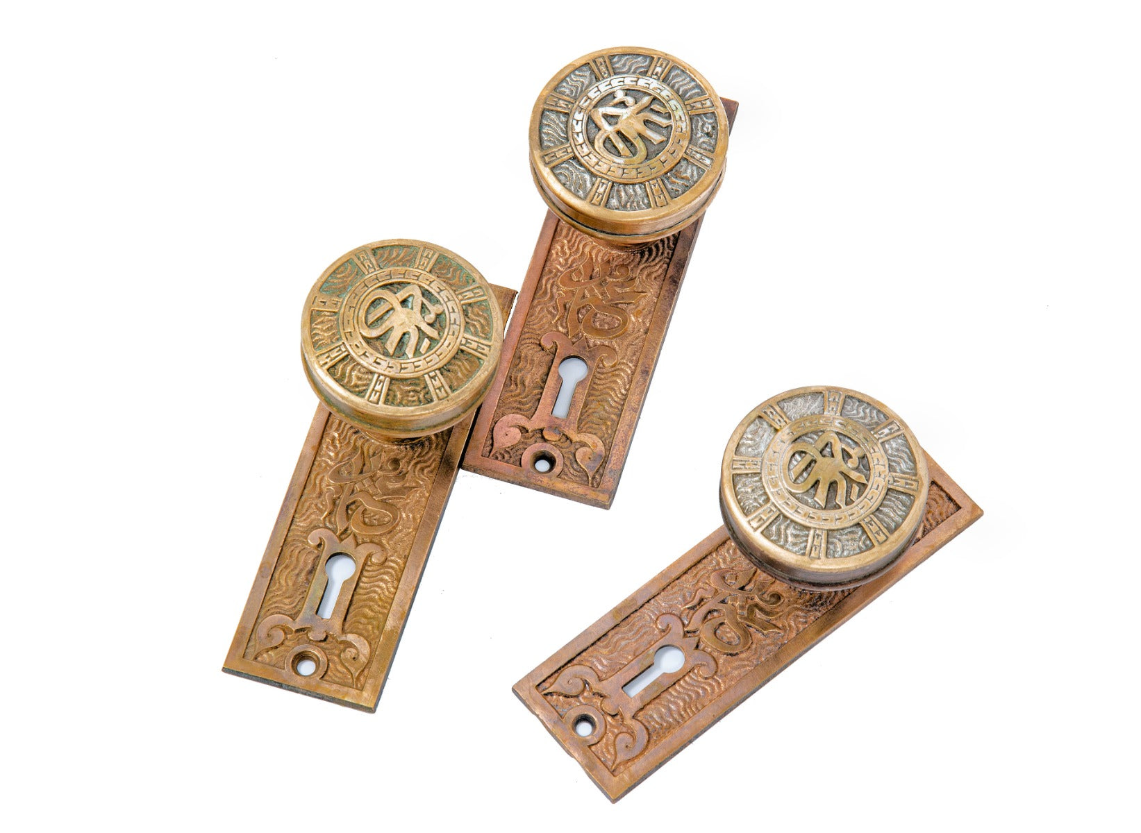 original 19th century ornamental cast brass "arabic" pattern mallory & wheeler doorknobs and backplates