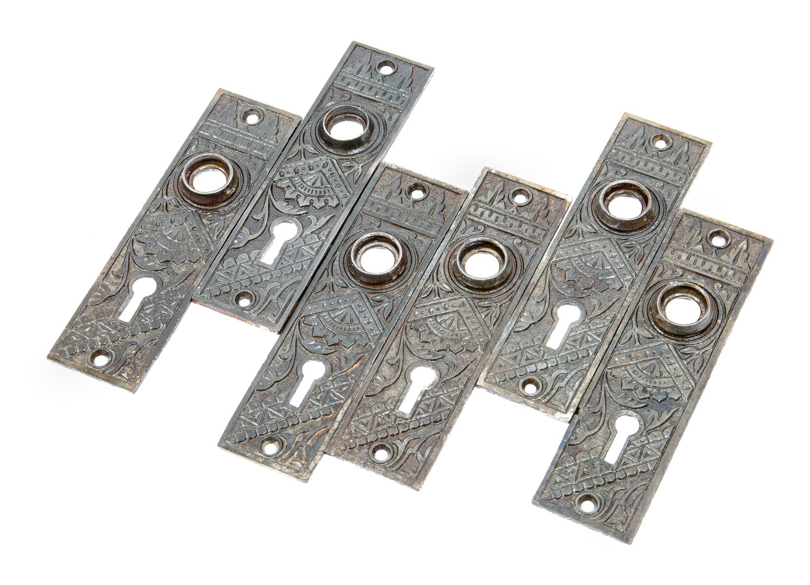 lot of matching interior residential salvaged chicago "oriental" pattern cast iron doorknob backplates