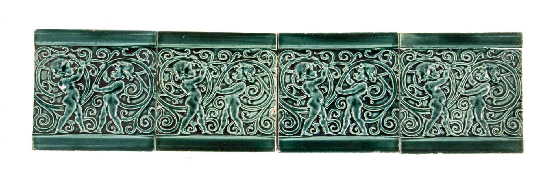 TWO matching original hard to find seagreen colored 1880s j. and j.g. low art tiles with foilage and cherubs