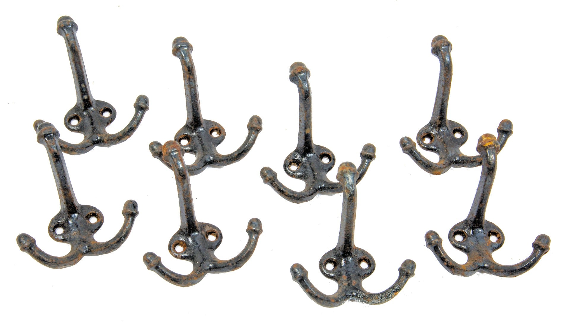 one of two matching lots of 8 original early 20th black enameled cast iron acorn finial chicago school hooks