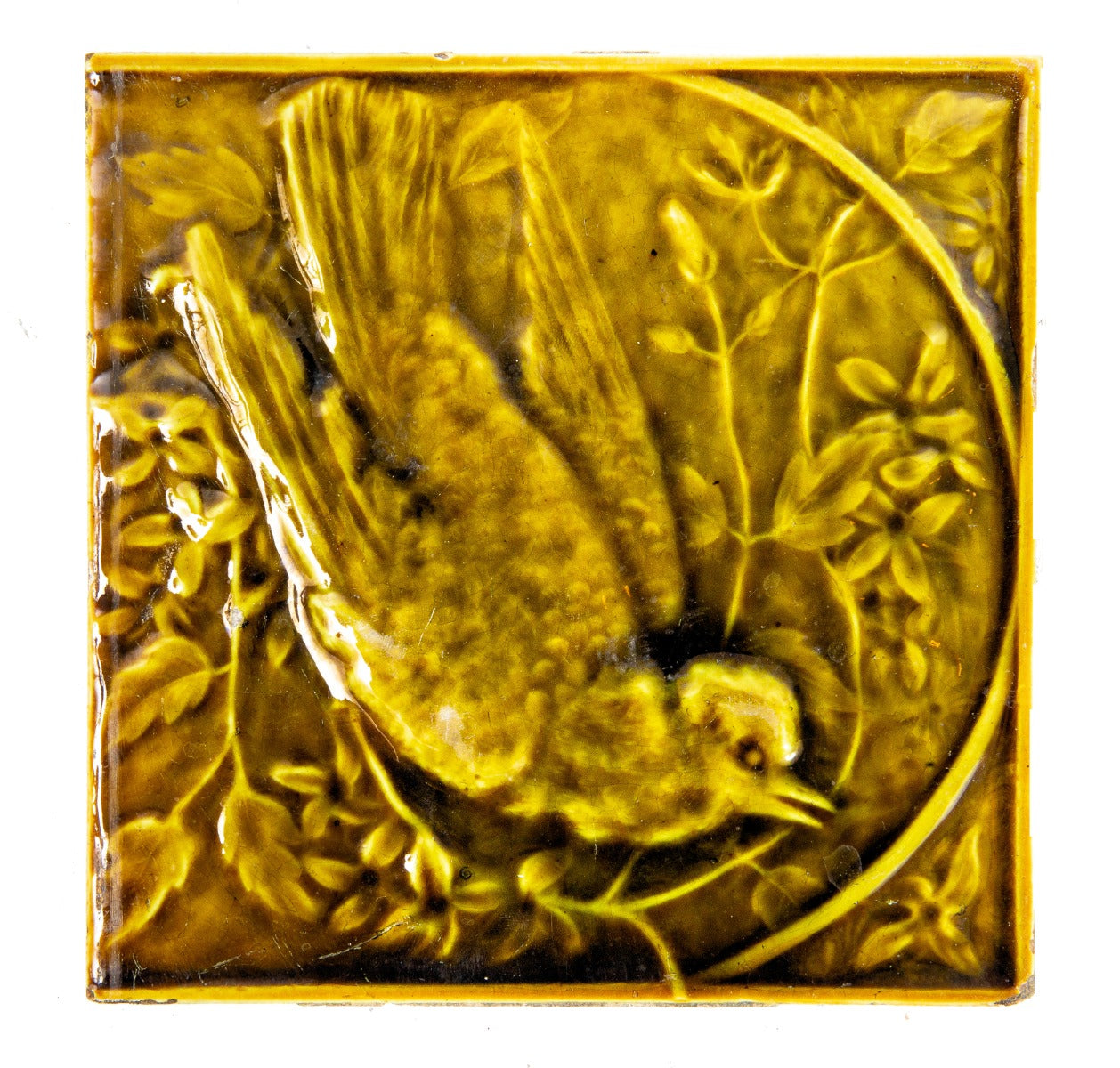 rare 19th century olive green figural bird fireplace tile designed and fabricated by the international tile of brooklyn, new york.