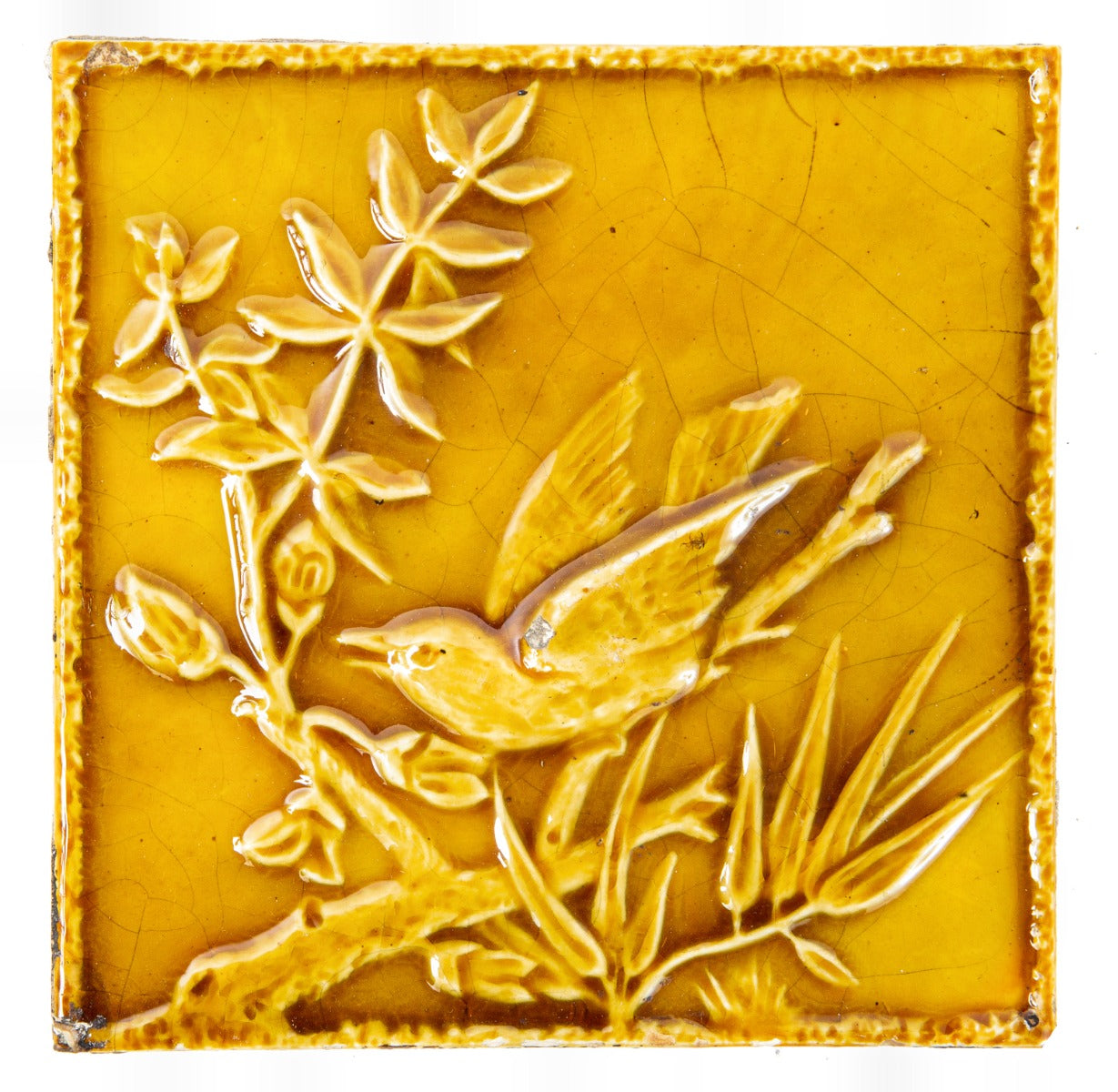 19th century 6 x 6 inch salvaged chicago butterscotch-colored majolica glazed american aesthetic winged bird fireplace tile