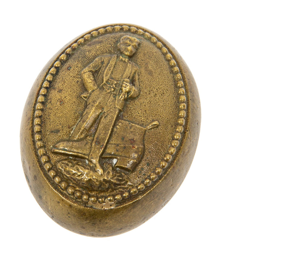 rare and unusual early 20th century custom-designed walk-over george e. keith company bronze doorknob with full-figured man and boot