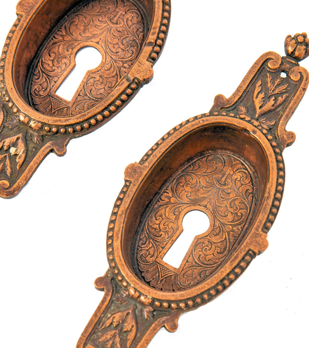 matching set of unusual 1860s-1870s copper and zinc ornamental residential pocket door backplates