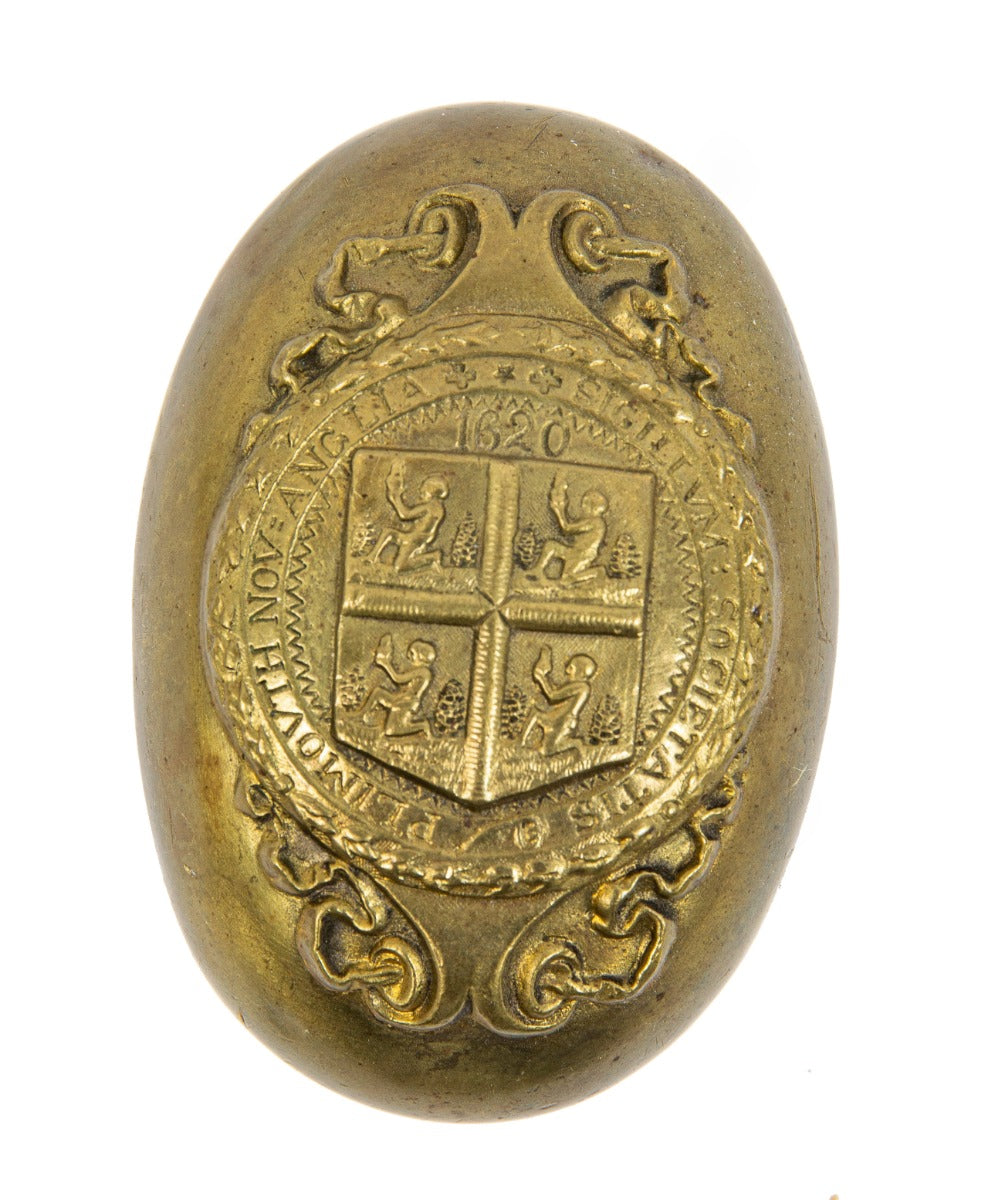 original early 20th century ornamental cast brass plymouth county oval-shaped emblematic doorknob