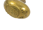 original early 20th century ornamental cast brass plymouth county oval-shaped emblematic doorknob