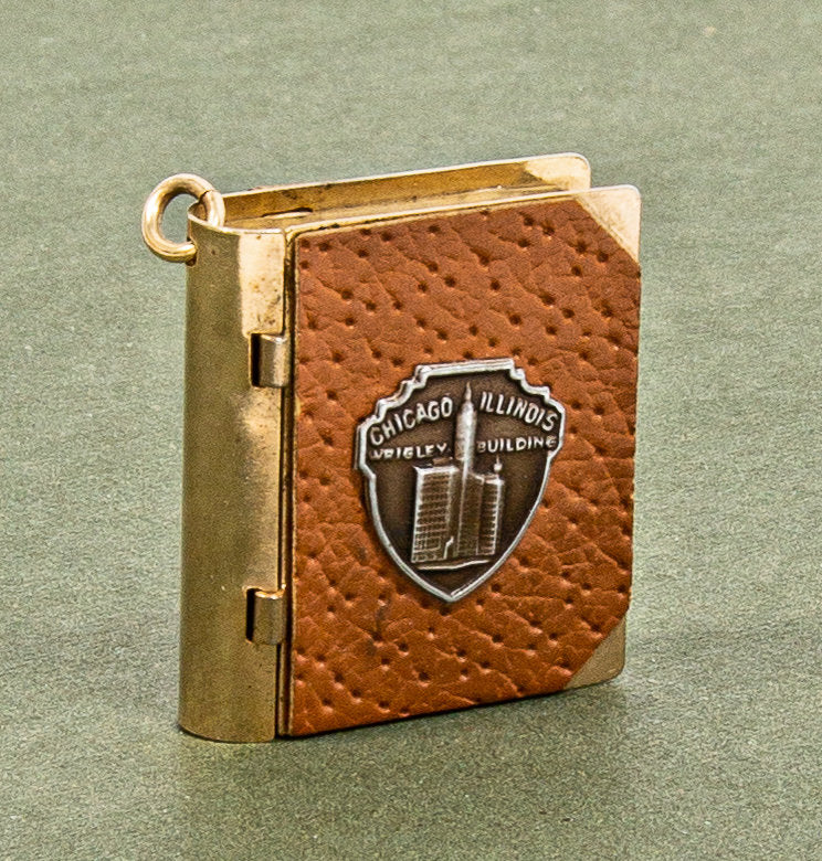 hard to find and completely intact miniature wrigley building photo album souvenir charm