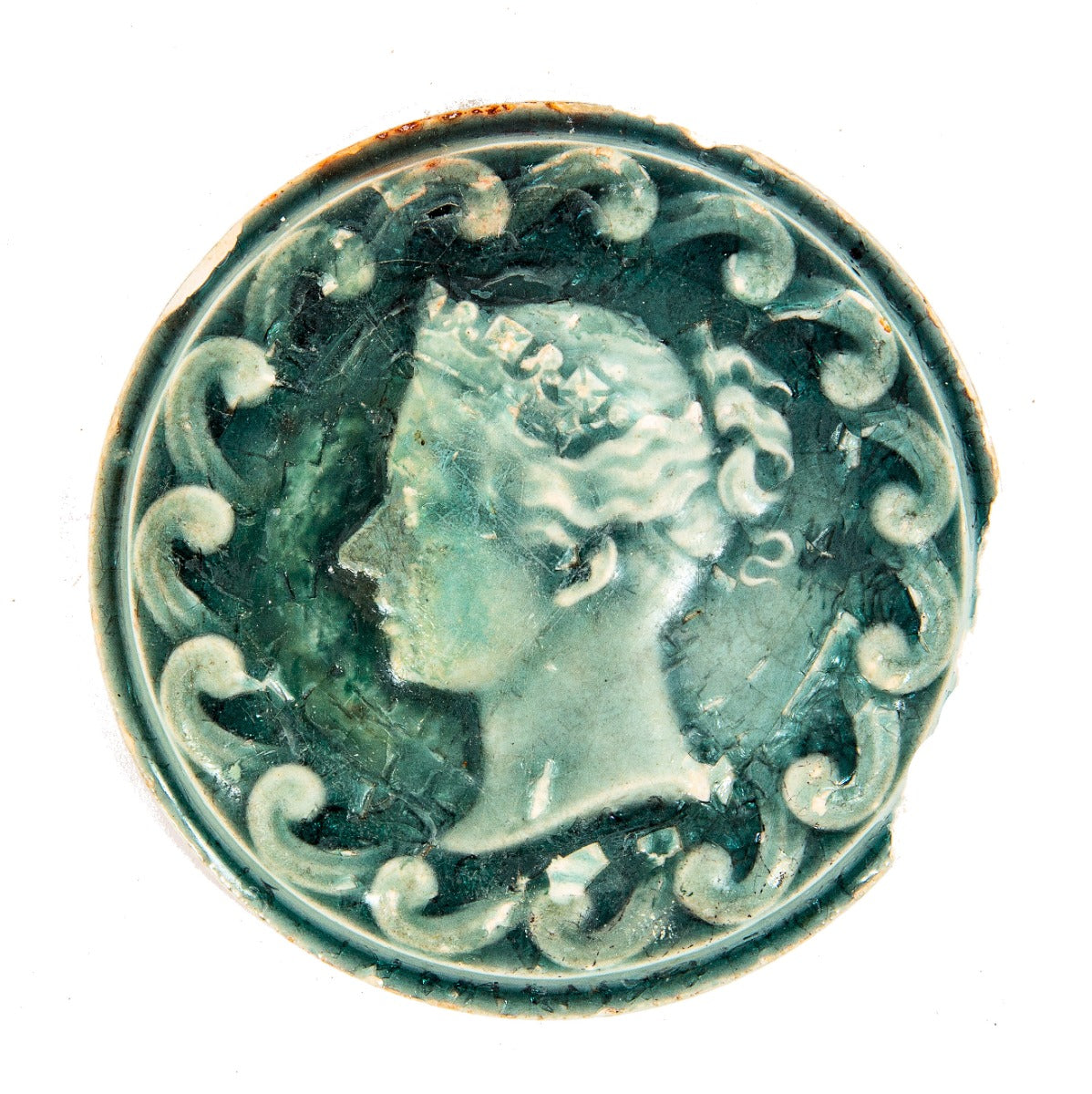 19th century salvaged chicago diminutive majolica-glazed circular-shaped figural stove tile