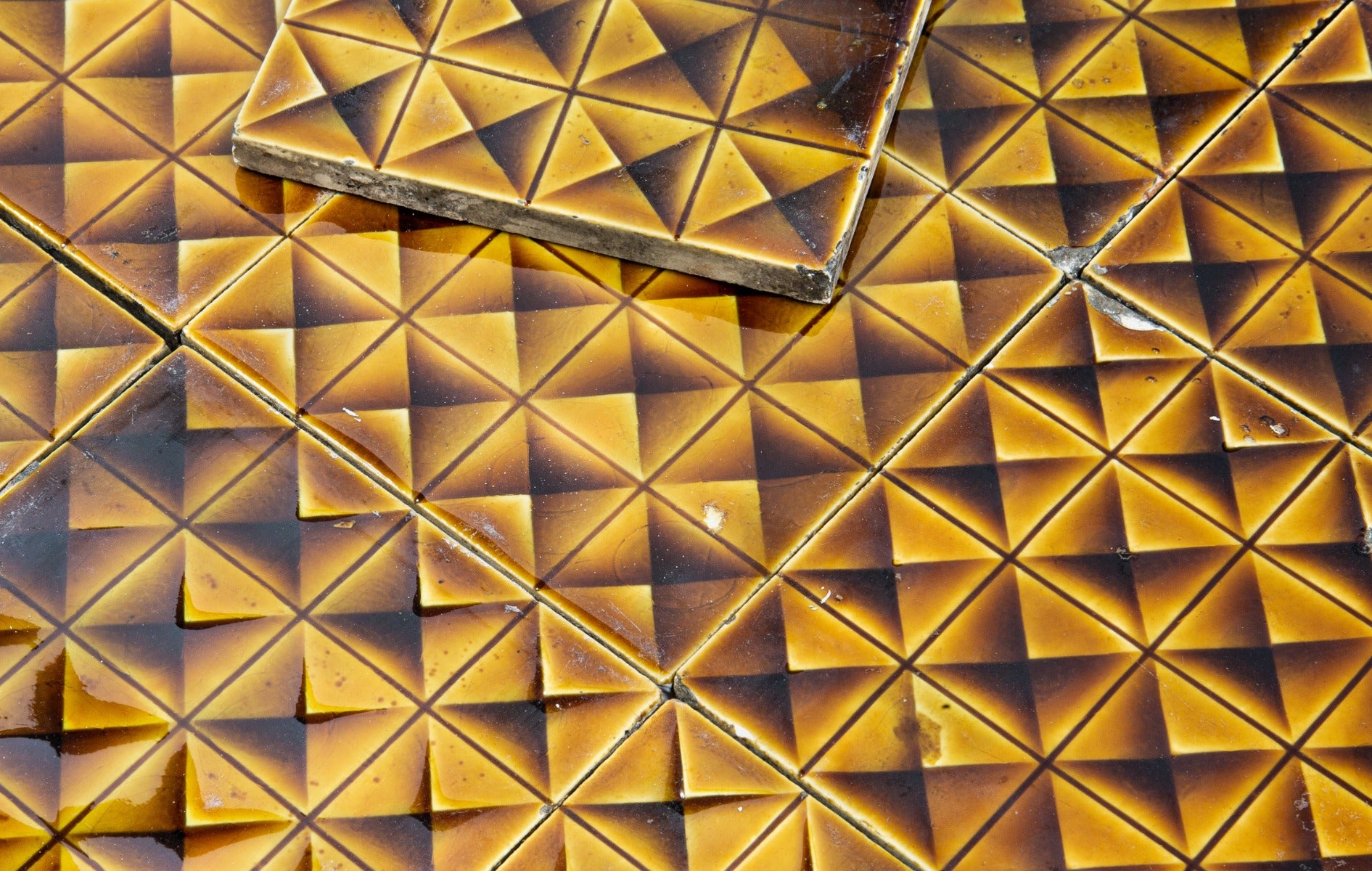 original 19th century antique american victorian-era strongly geometric patterned majolica fireplace tiles