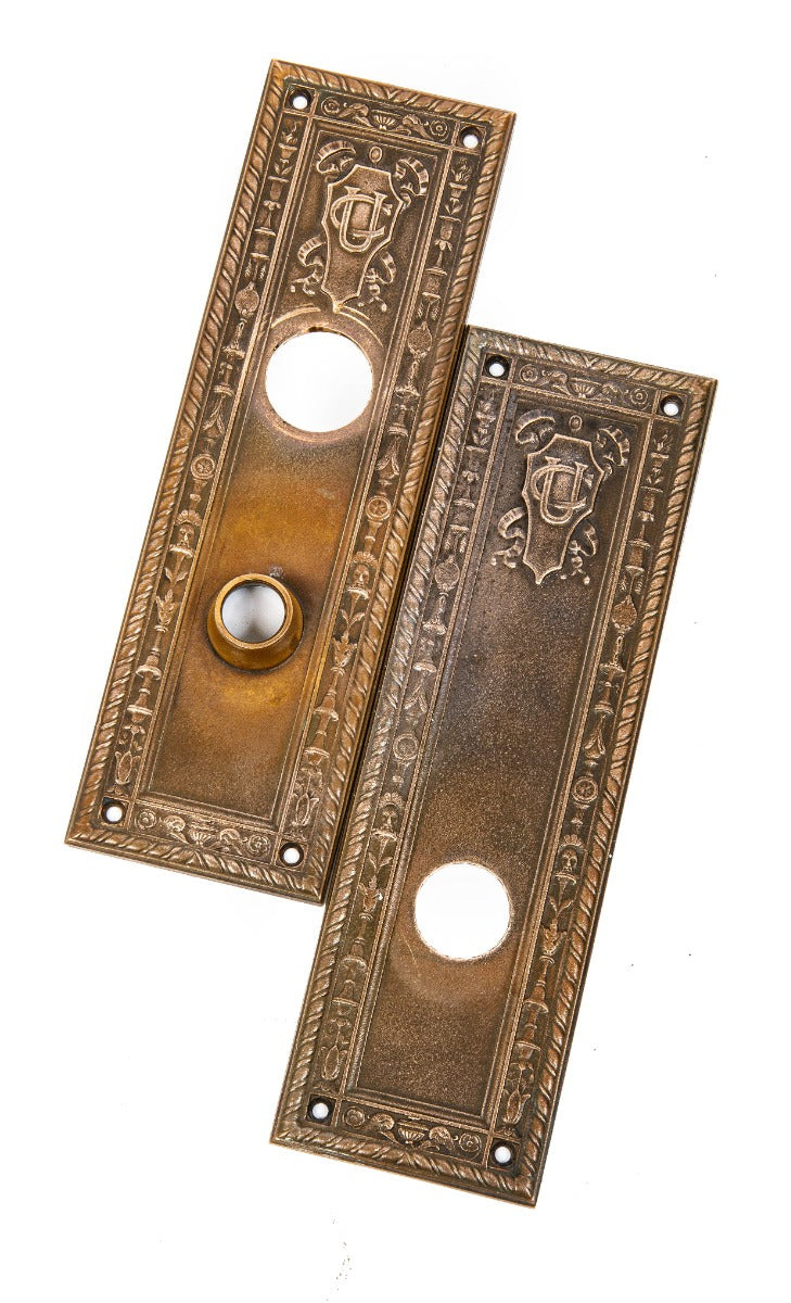 two matching cast bronze union central life insurance company building doorknob backplates designed by cass gilbert