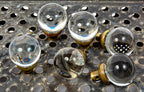 group of exceptionally rare oversized polished glass globe-shaped interior salvaged chicago doorknobs with brass shanks