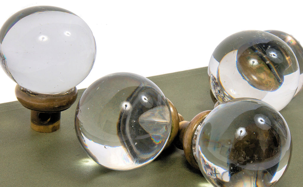 group of exceptionally rare oversized polished glass globe-shaped interior salvaged chicago doorknobs with brass shanks