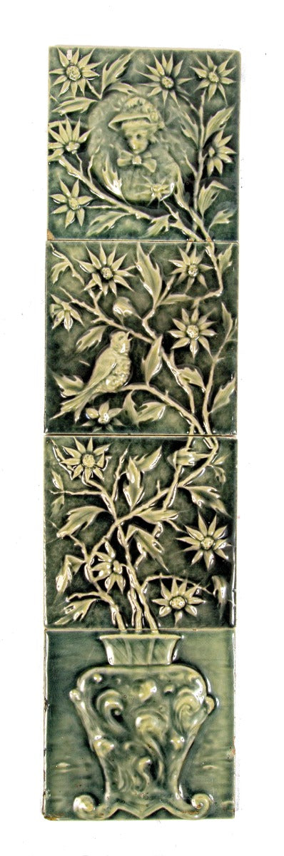 remarkable all original 19th century richly colored blue-green majolica glazed figural fireplace tile set executed by beaver falls tile company