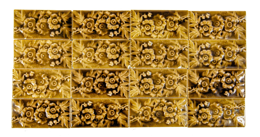 large lot of matching 19th century american victorian-era 3 x 6 inch salvaged chicago majolica tiles with floral motifs