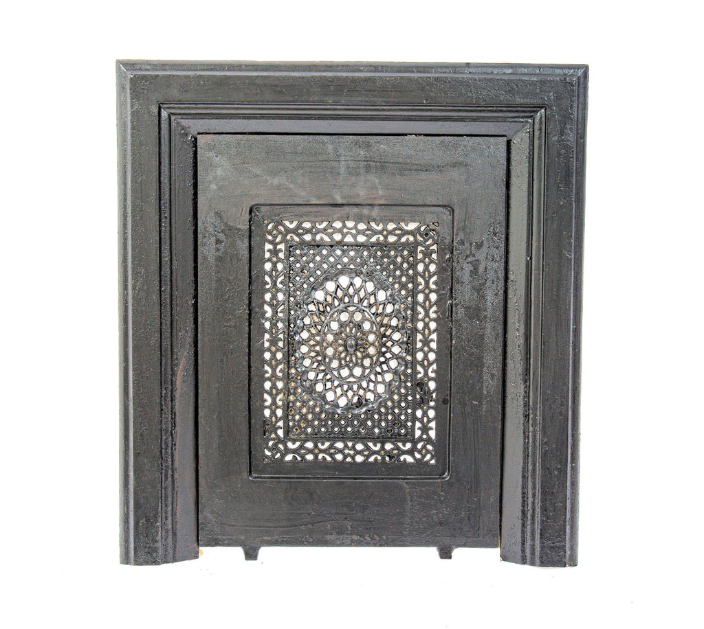 well-executed original and intact 19th century ornamental cast iron interior residential fireplace summer cover and surround