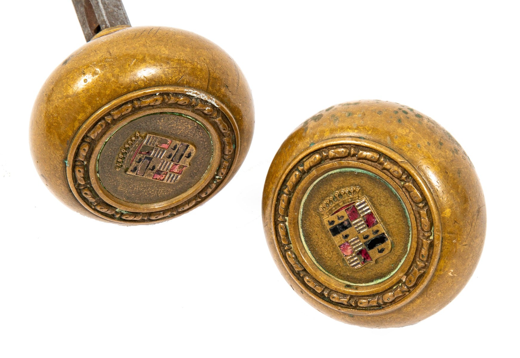 two matching original early 20th century unique book-cadillac hotel cast brass emblematic doorknobs