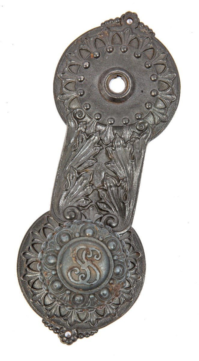 original john wellborn root-designed ornamental cast iron doorknob and matching backplate from the society for savings building