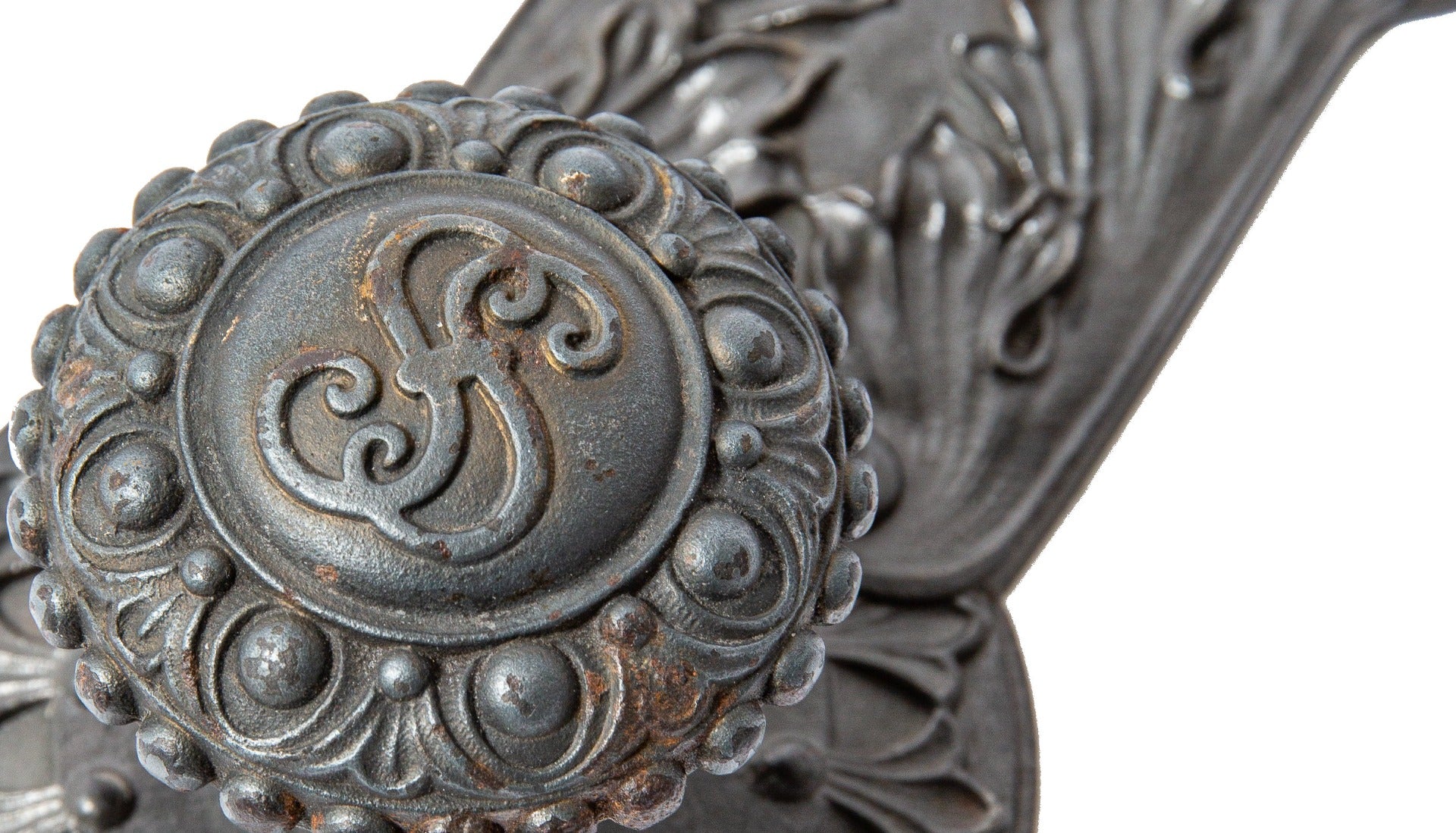 original john wellborn root-designed ornamental cast iron doorknob and matching backplate from the society for savings building