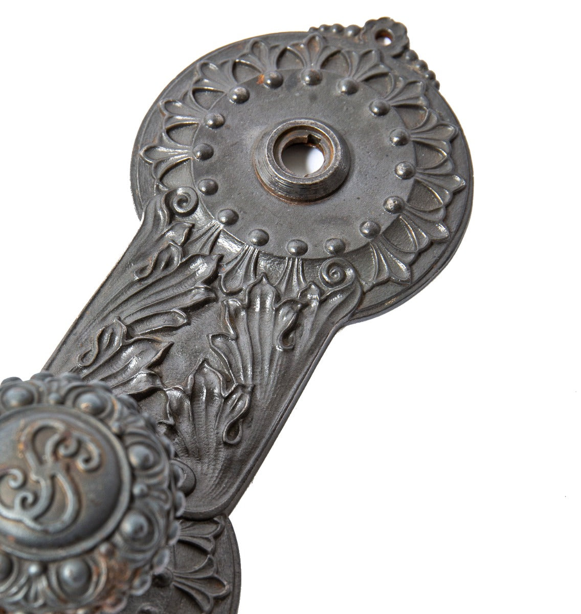 original john wellborn root-designed ornamental cast iron doorknob and matching backplate from the society for savings building