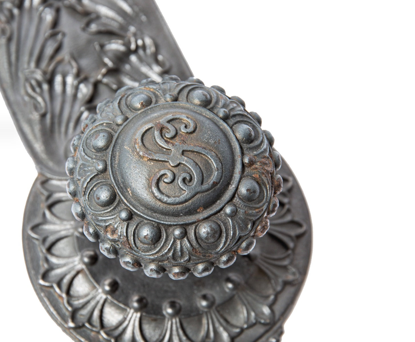 original john wellborn root-designed ornamental cast iron doorknob and matching backplate from the society for savings building