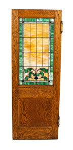 one of two matching custom-designed early 20th century oak and stained glass chicago funeral parlor swinging doors