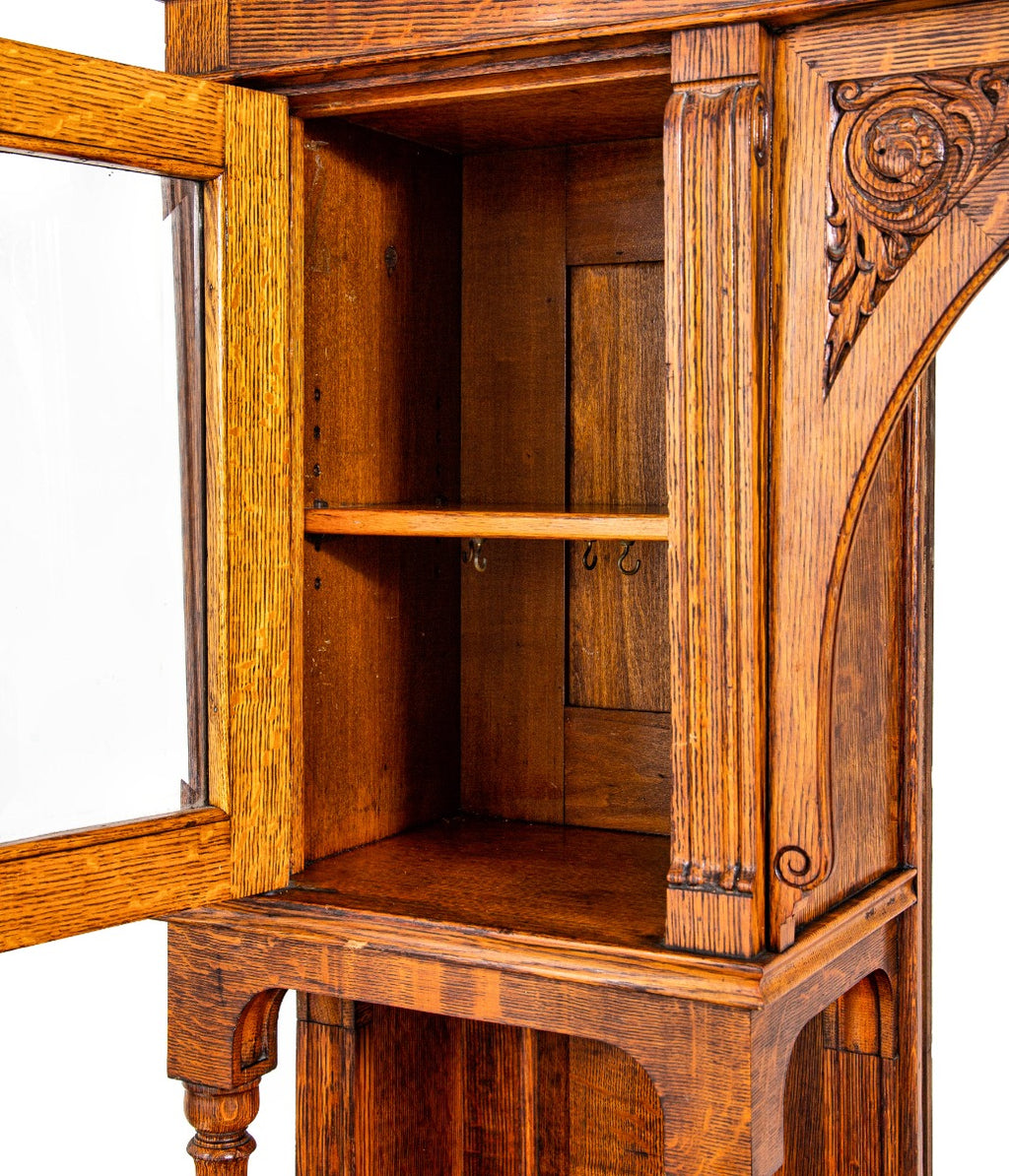 remarkable 1880s edbrooke and burnham-designed chicago varnished quartered oak wood residential built-in cabinet with intact mirror and beveled glass cabinet doors
