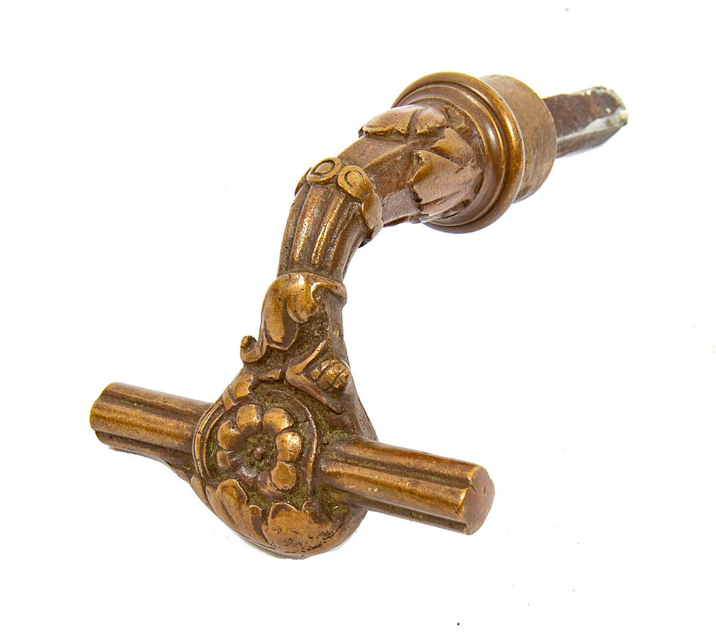 victorian era ornamental cast bronze t-handle style knob hardware manufactured for the metallic compression casting co., in boston, ma.
