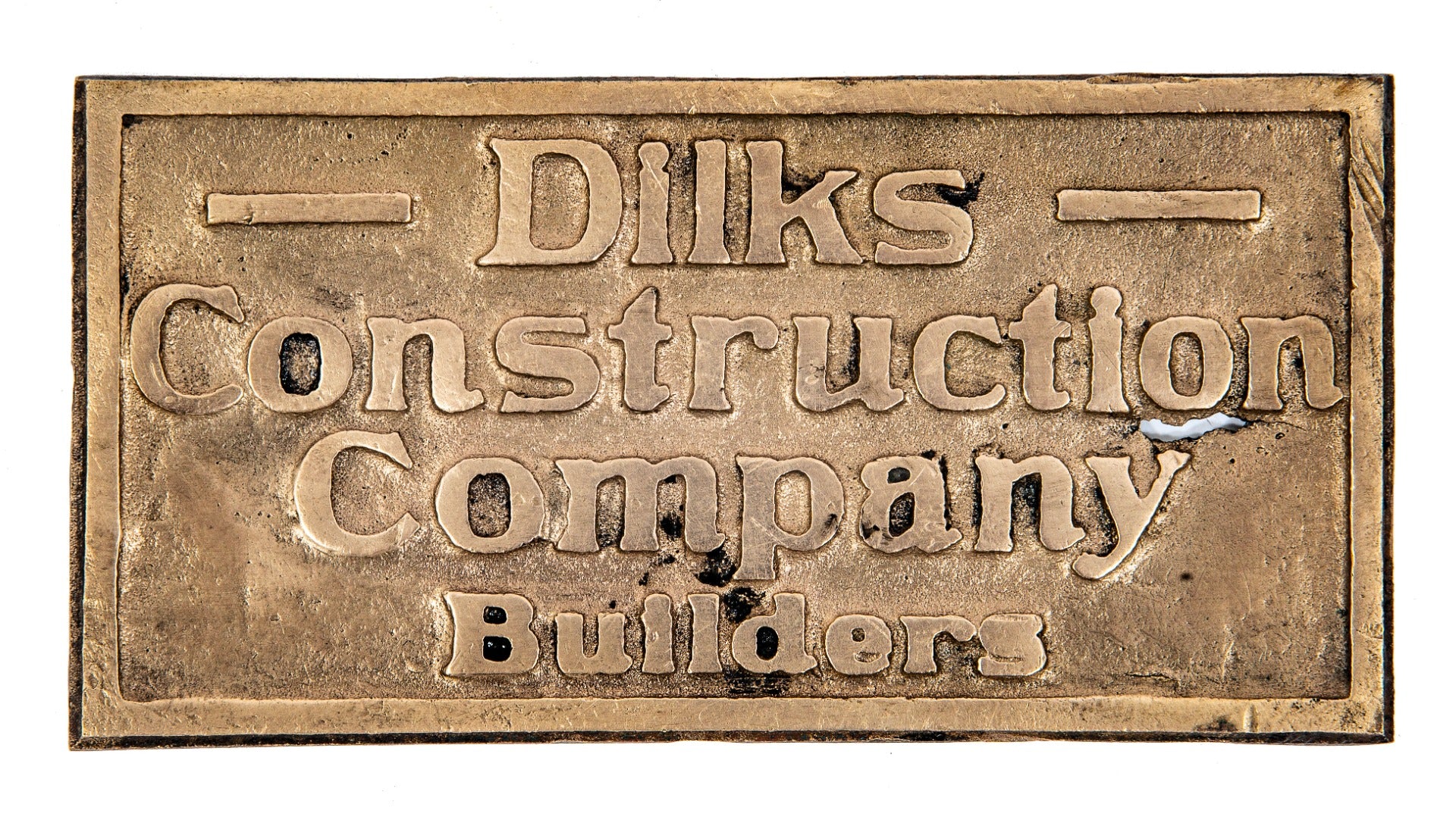 hard to find early 20th century nicely worn cast bronze single-sided dilks construction company builders plaque
