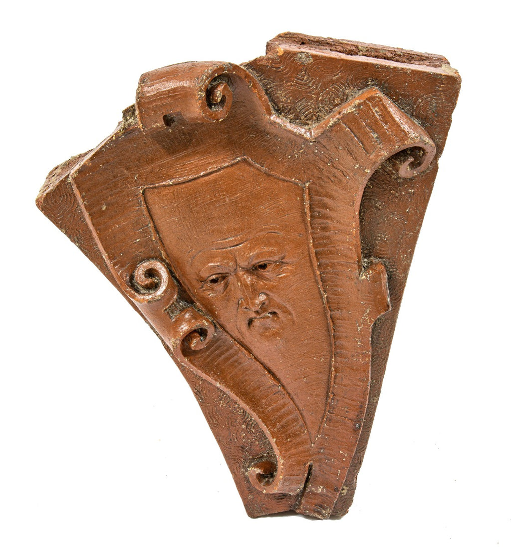 clinton j. warren-designed red slip glazed lexington hotel exterior loggia cartouche with lightly incised face