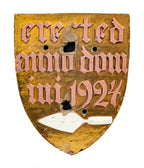 c. 1920's 24-karat gold glazed ornamental terra cotta r.r. donnelley printing plant exterior facade shield with hand trowel