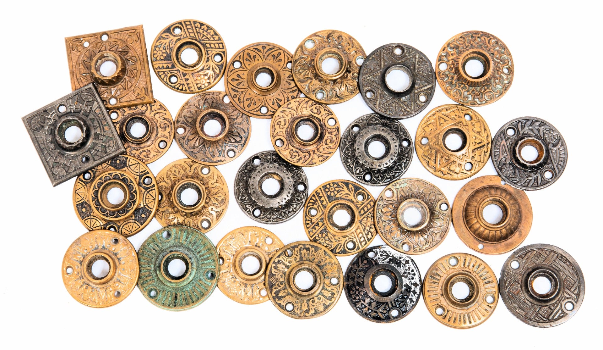 large lot or late 19th ans early 20th century ornamental brass, bronze, and iron salvaged chicago doorknob rosettes