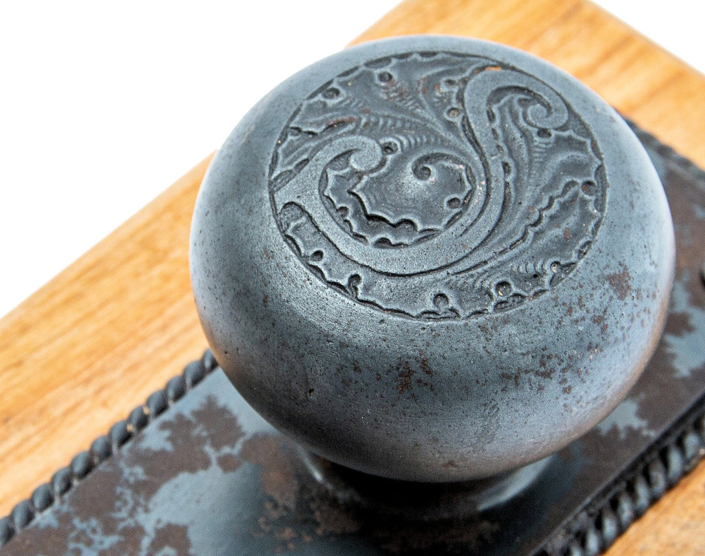 original 1892 louis h. sullivan-designed ornamental cast iron schiller building or garrick theater doorknob and backplate