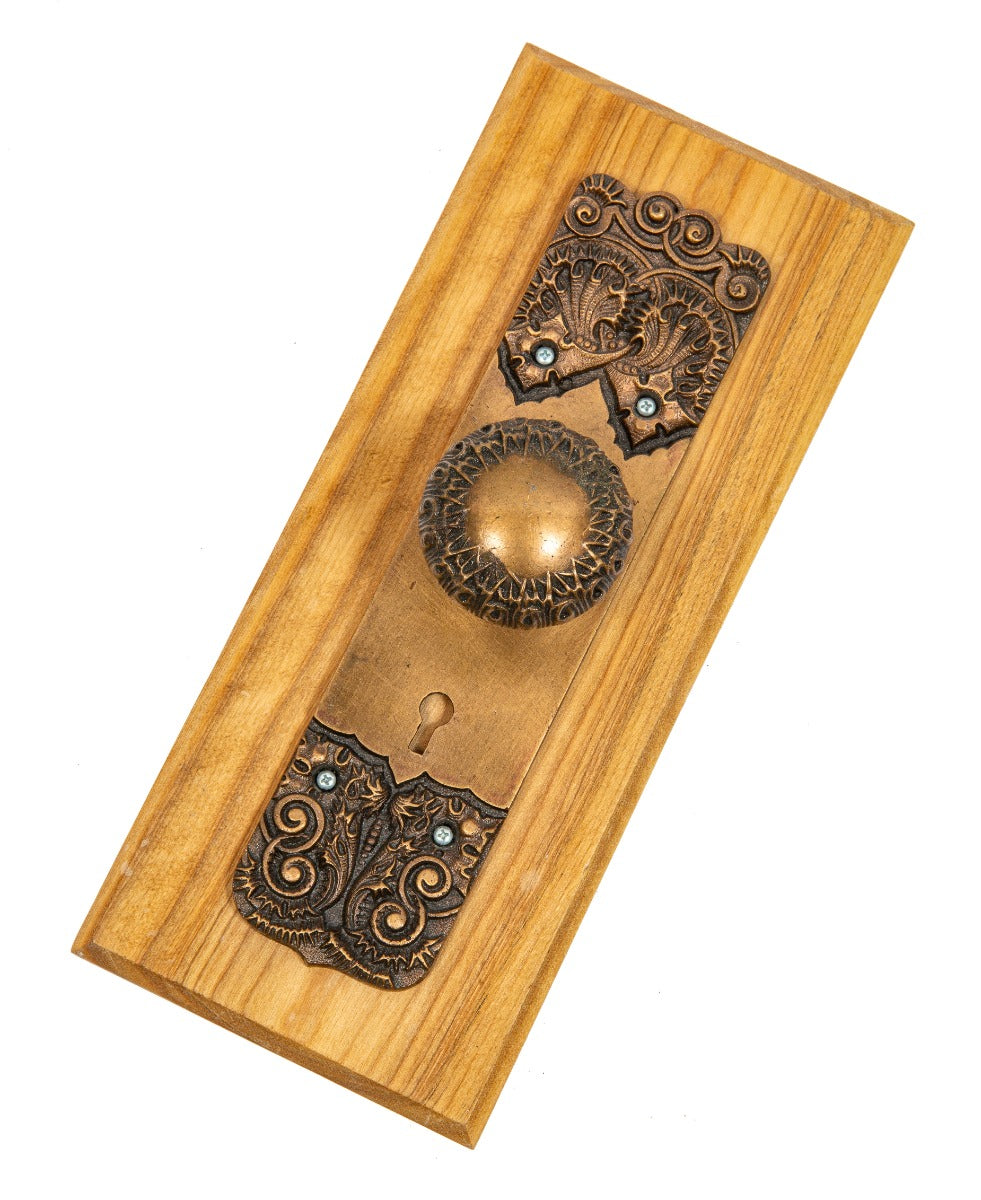 1890s original ornamental cast bronze "thistle" pattern backplate and matching doorknob with mount