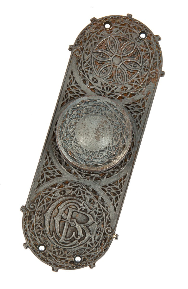 original louis h. sullivan-designed ornamental cast iron chicago stock exchange monogrammed backplate with matching doorknob