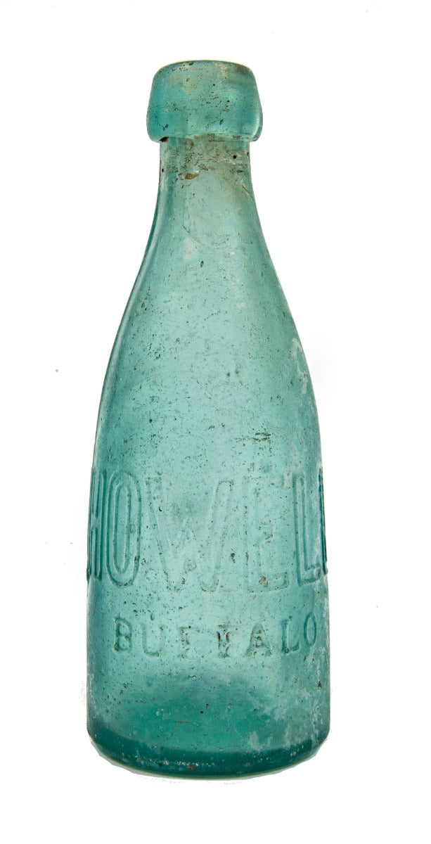 civil war-era aqua blue pony style glass soda bottle manufactured for howell and smith in buffalo, new york.