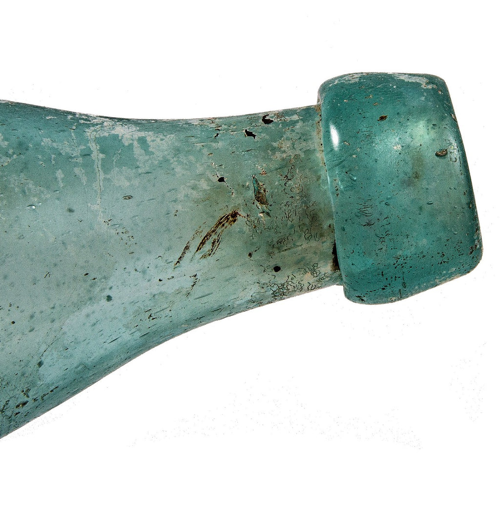 civil war-era aqua blue pony style glass soda bottle manufactured for howell and smith in buffalo, new york.