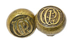 two matching late 19th or early 20th century cast brass monogrammed chicago public works building doorknobs