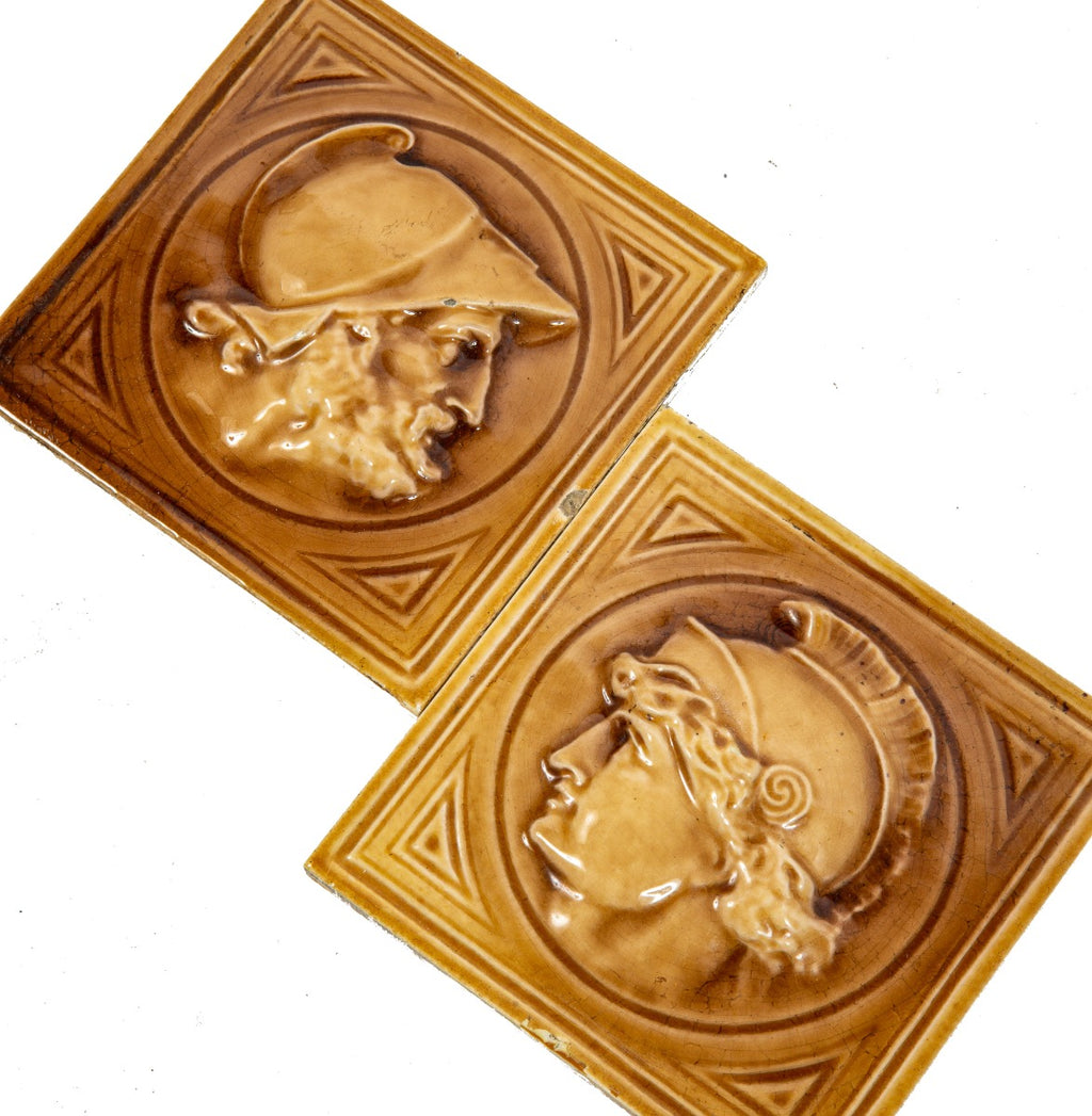 two hard to find salvaged chicago original late 1880s j. & j.g. low art fireplace tiles featuring greek or roman soldiers