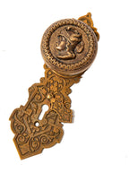 original 1870s metal compression casting company plumed knight doorknob and matching entrance door backplate